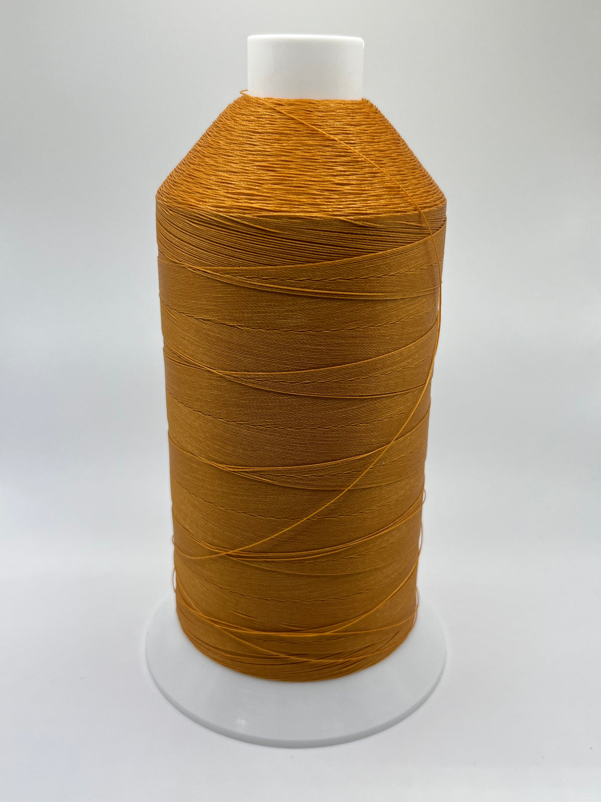 92 Tex 90 Serabond Poly Bonded 1 lb. 6000YD Color 7477U Ochre